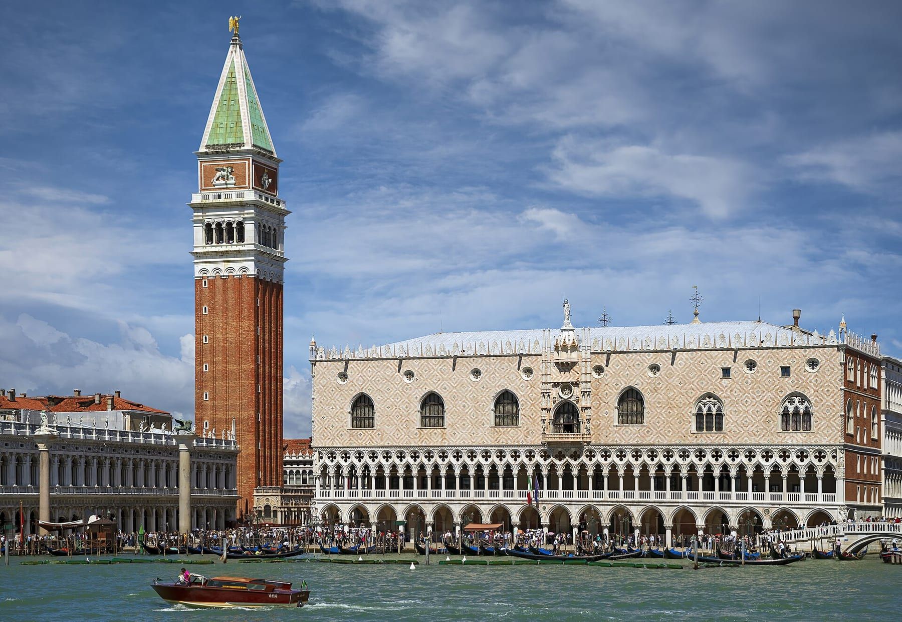 The Doge's Palace seen from the water with gondolas moored in front